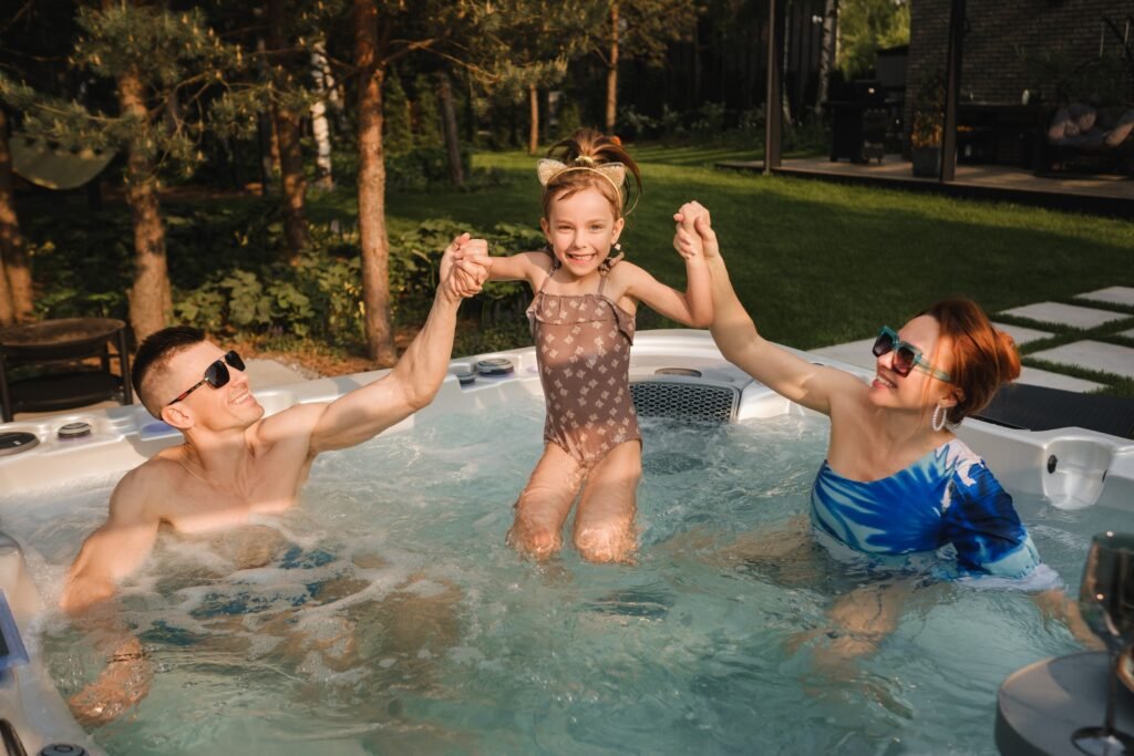 Saltwater hot tub with family soaking outdoors in summer